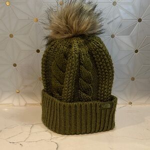 The North Face Green Cable Knit “Oh Mega” Beanie with Faux Fur Pom